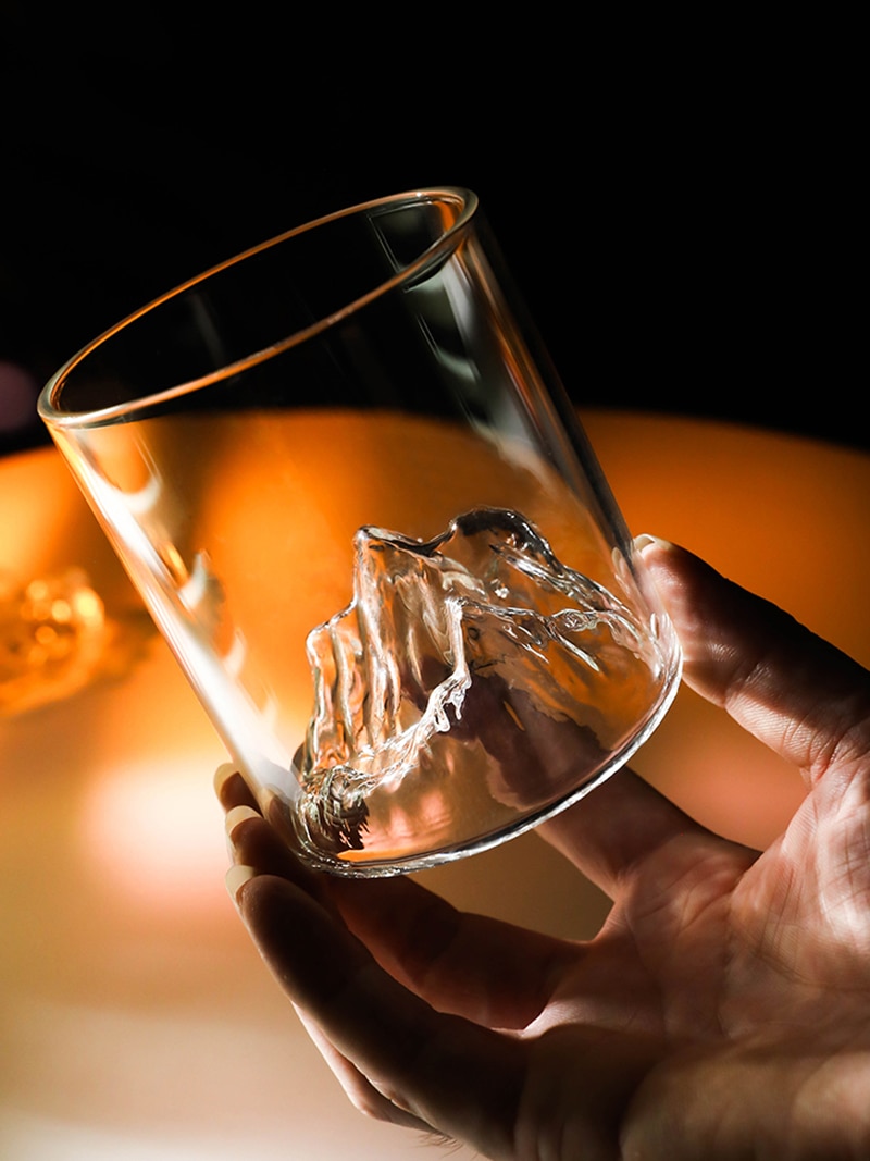 A creative cocktail glass - in a variety of shapes. Also drank at a bar  night